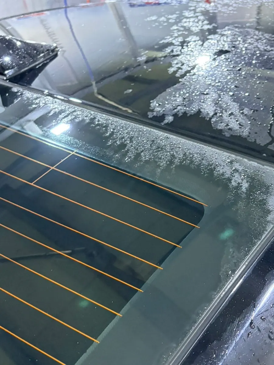Car windshield after completing oil-film removal and rinsing