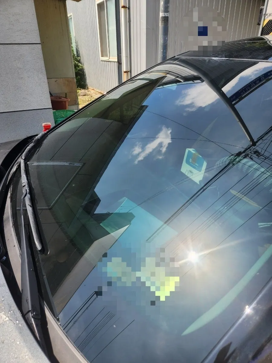 Car windshield after oil-film removal and rinsing