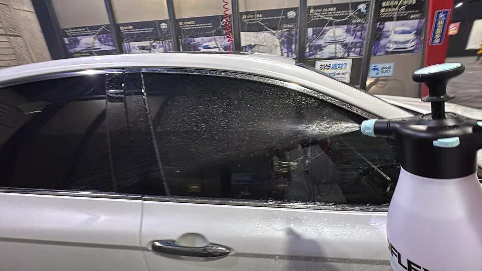Applying pre-wash to the vehicle before the main wash