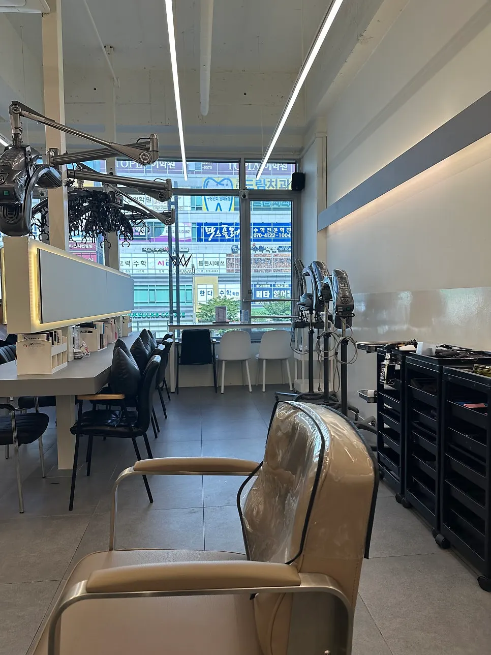 Interior of the salon with client gowned up and ready for treatment