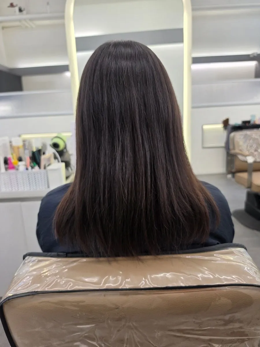 Hair in front of the mirror before the treatment started
