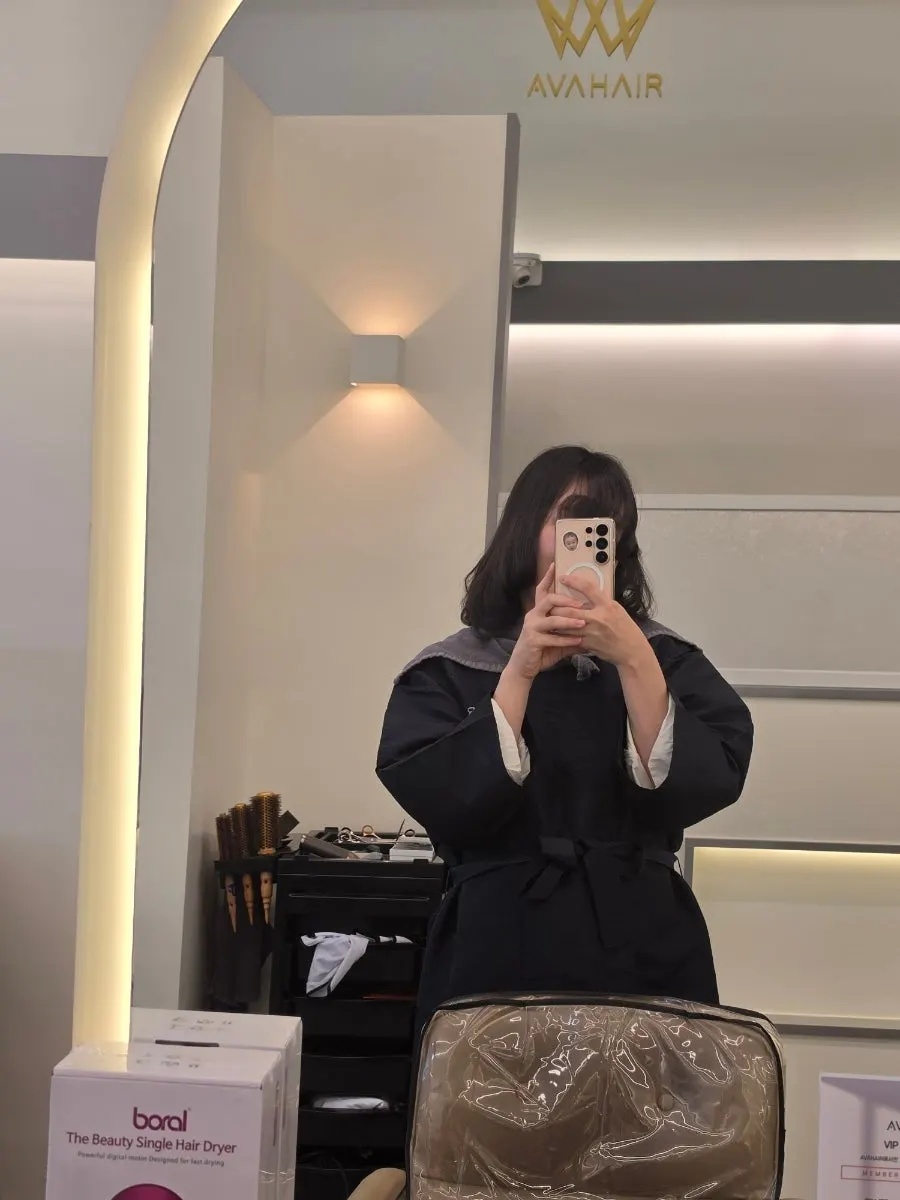 Mid-process hair looking bouncy between rod sections