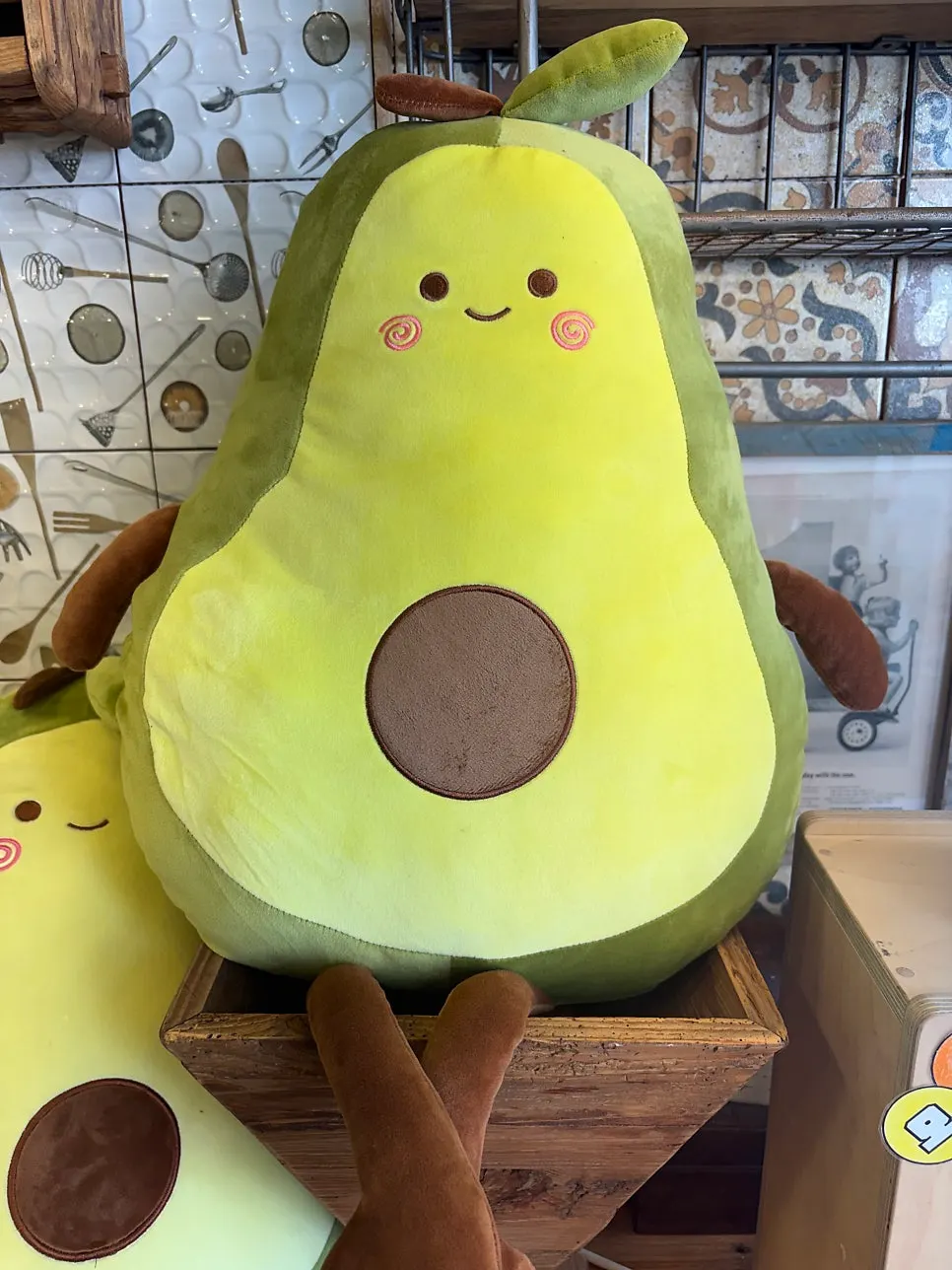 Giant avocado doll inside the store