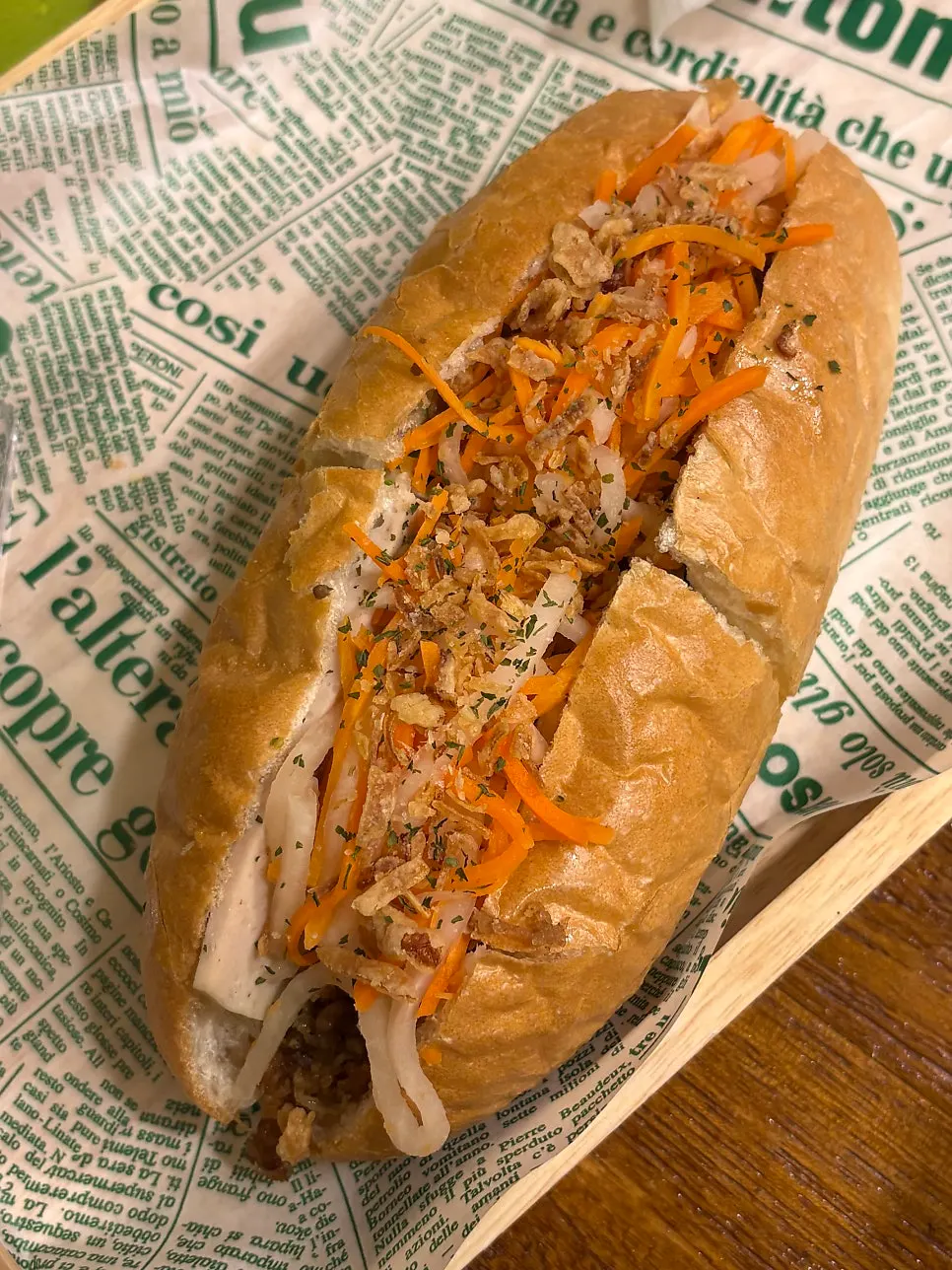 A large avocado banh mi sandwich