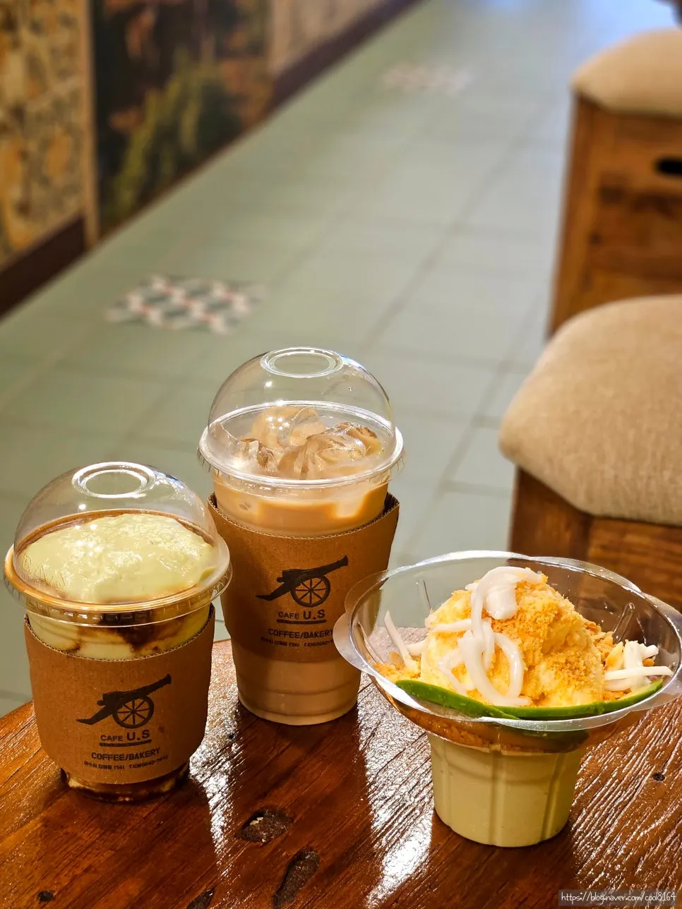 Avocado coffee and condensed milk latte at the table