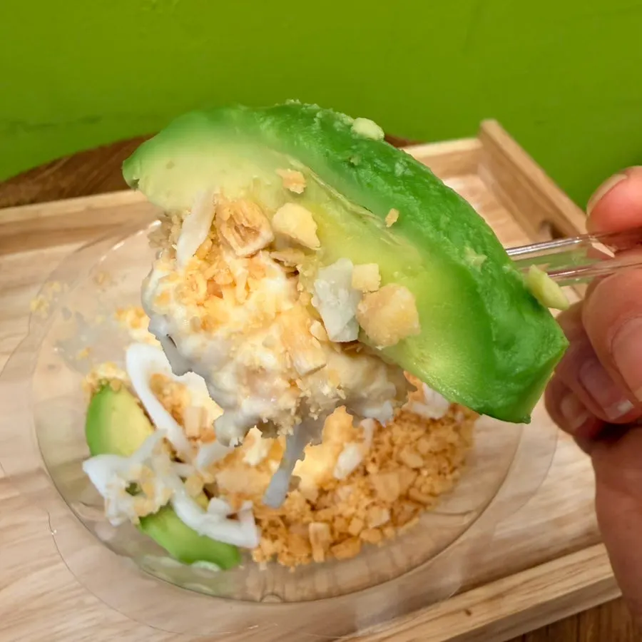 A spoonful of avocado and ice cream