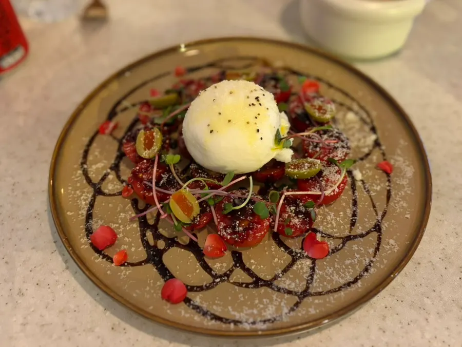 Rose caprese topped with burrata cheese