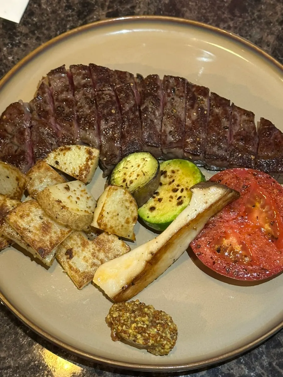 Hanwoo steak served with grilled vegetables