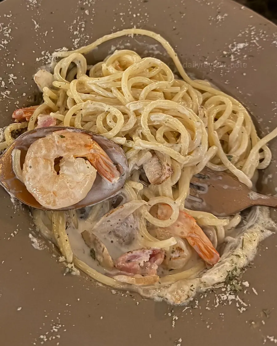 White Rose Pasta lifted up with a fork