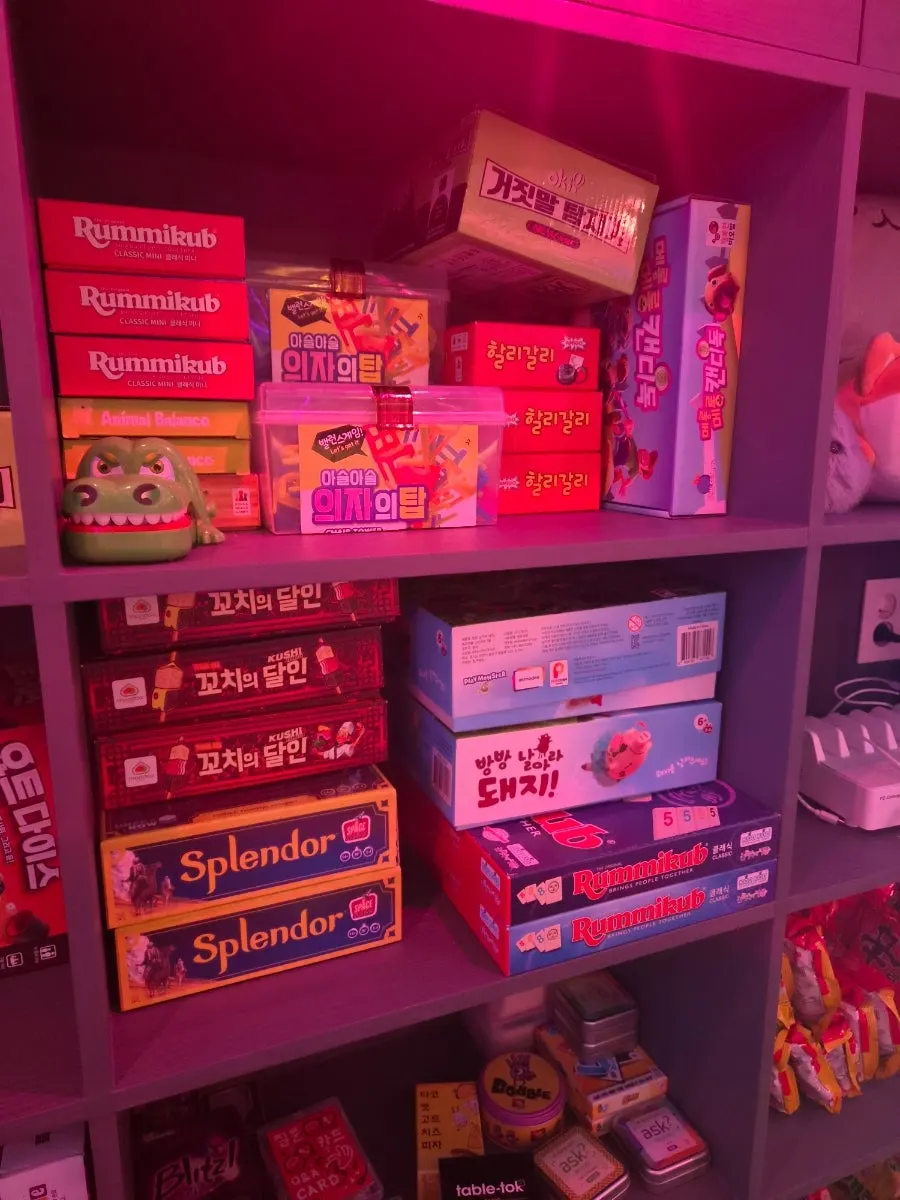 Wall filled with free board games for rental