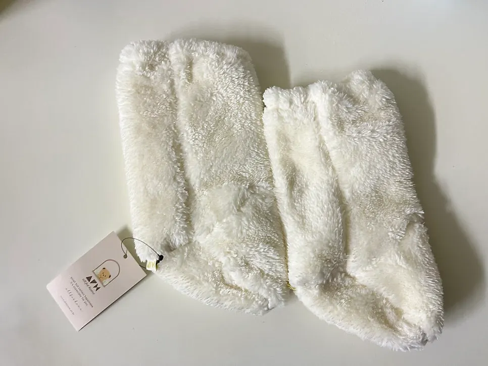 Getting ready for an outing with baby winter foot warmers