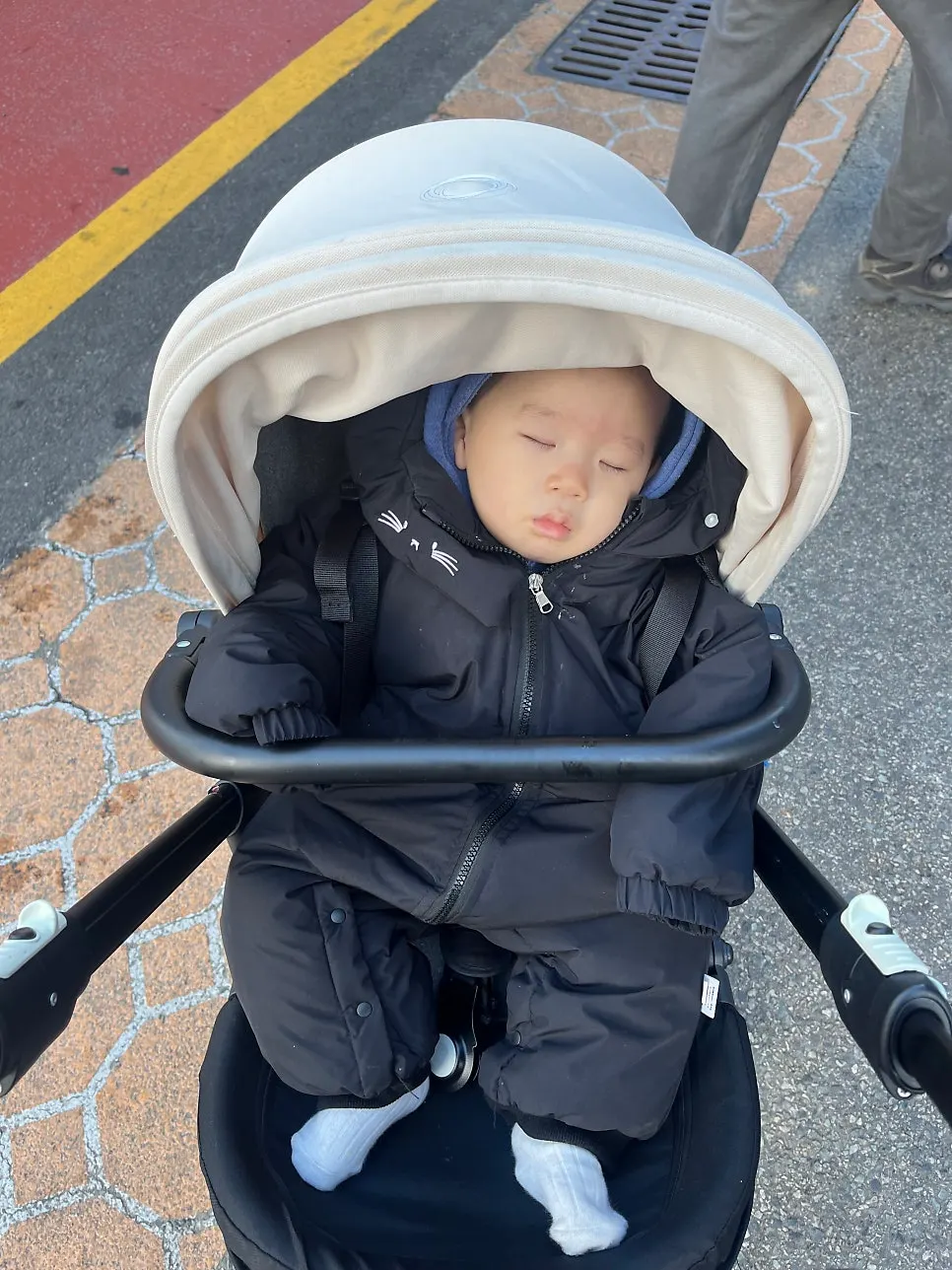 Baby bundled warmly for a winter outing