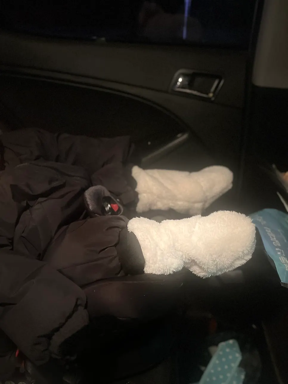 Baby wearing warm foot warmers