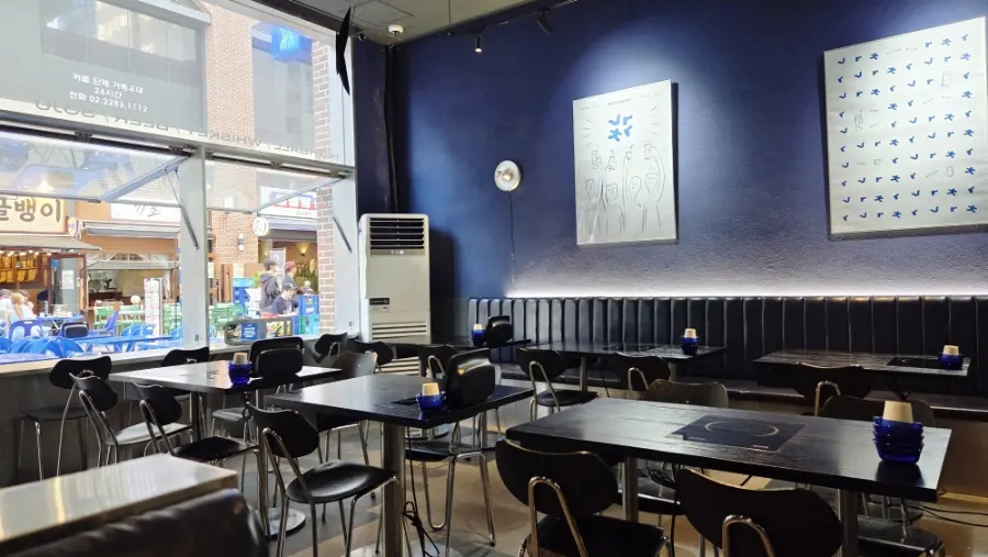 Black-toned interior seating at Bacha Munjeong