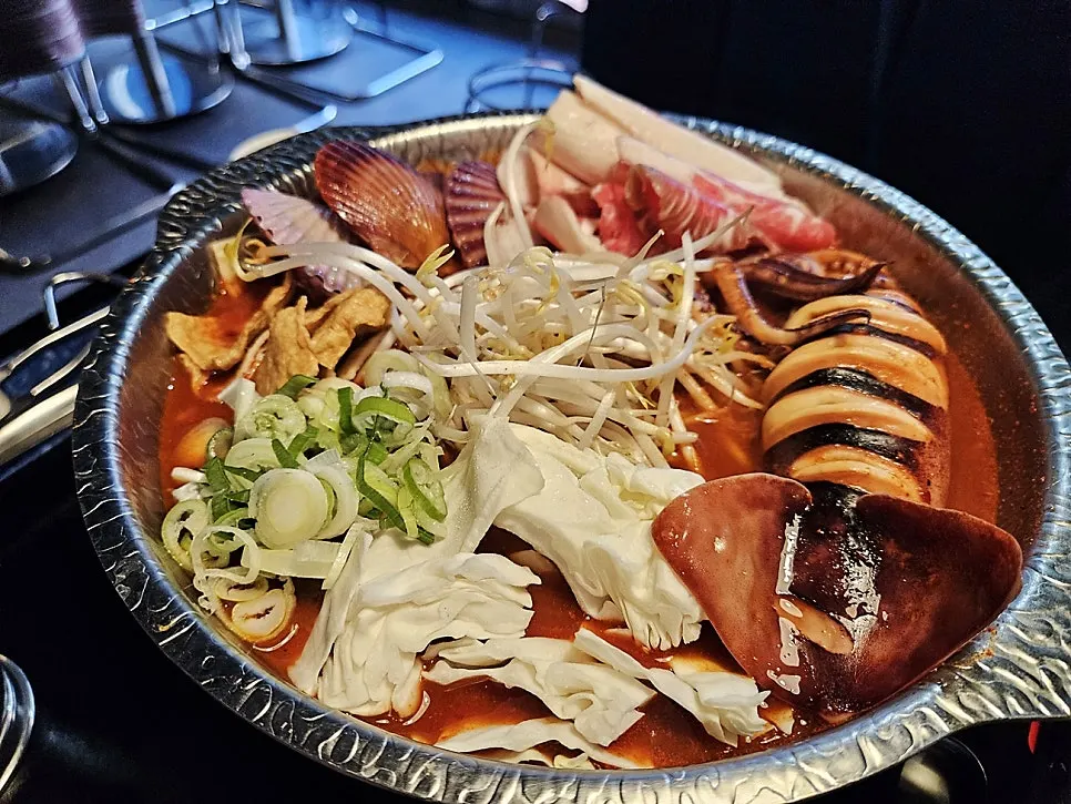 Instant chadolbagi seafood tteokjjim served in a pot