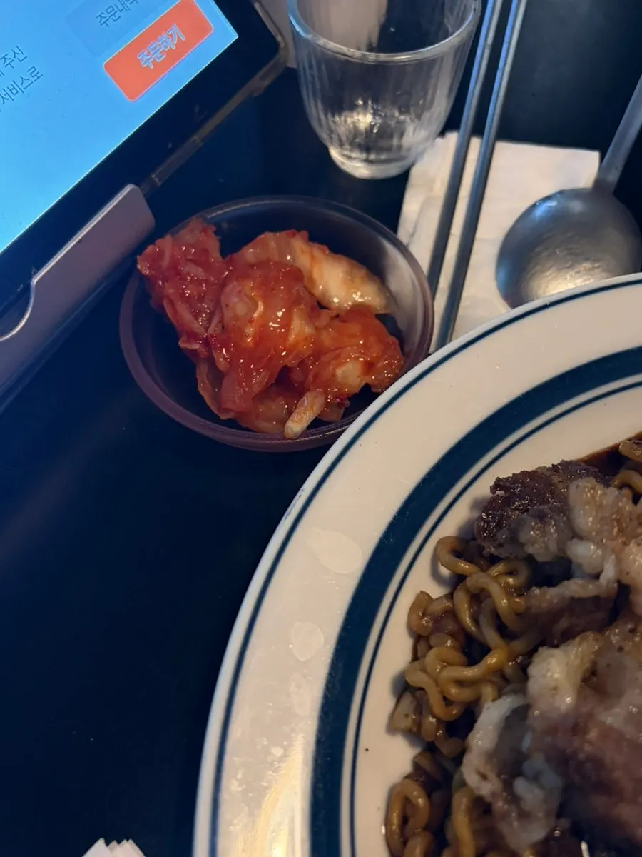 Noodles coated thickly in sauce in the beef brisket jjapaghetti