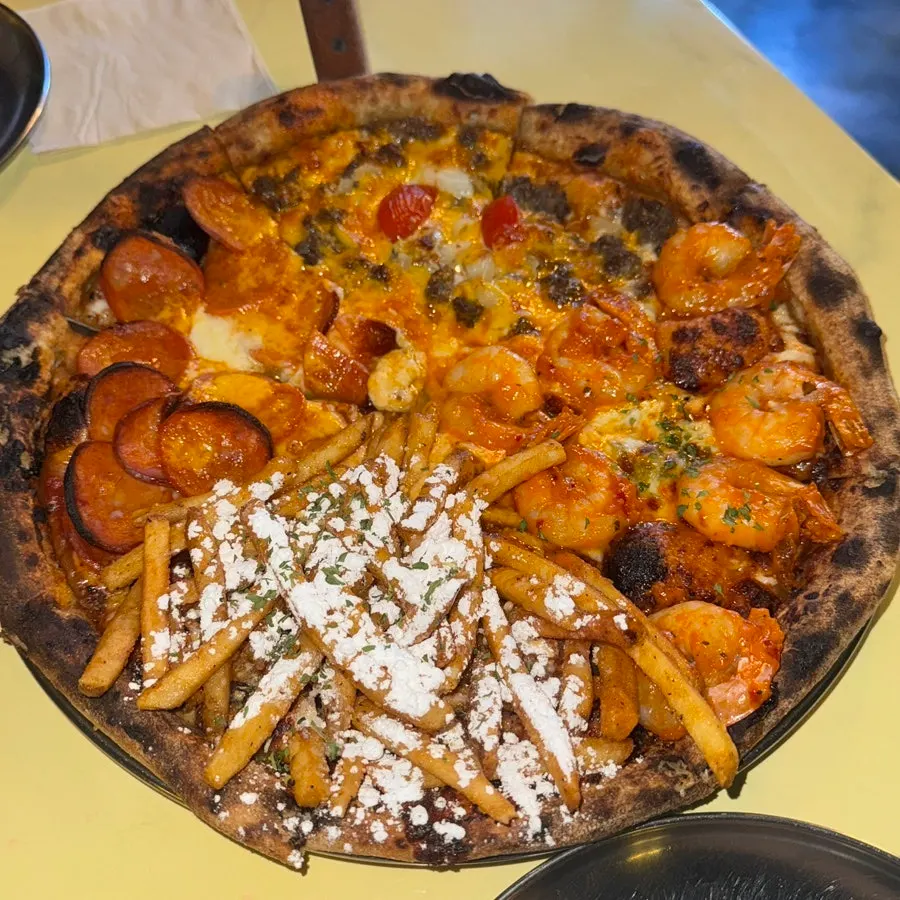 Close-up of Quarter Street pizza piled with toppings