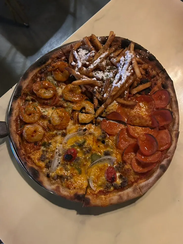 Quarter Street pizza with four signature flavors