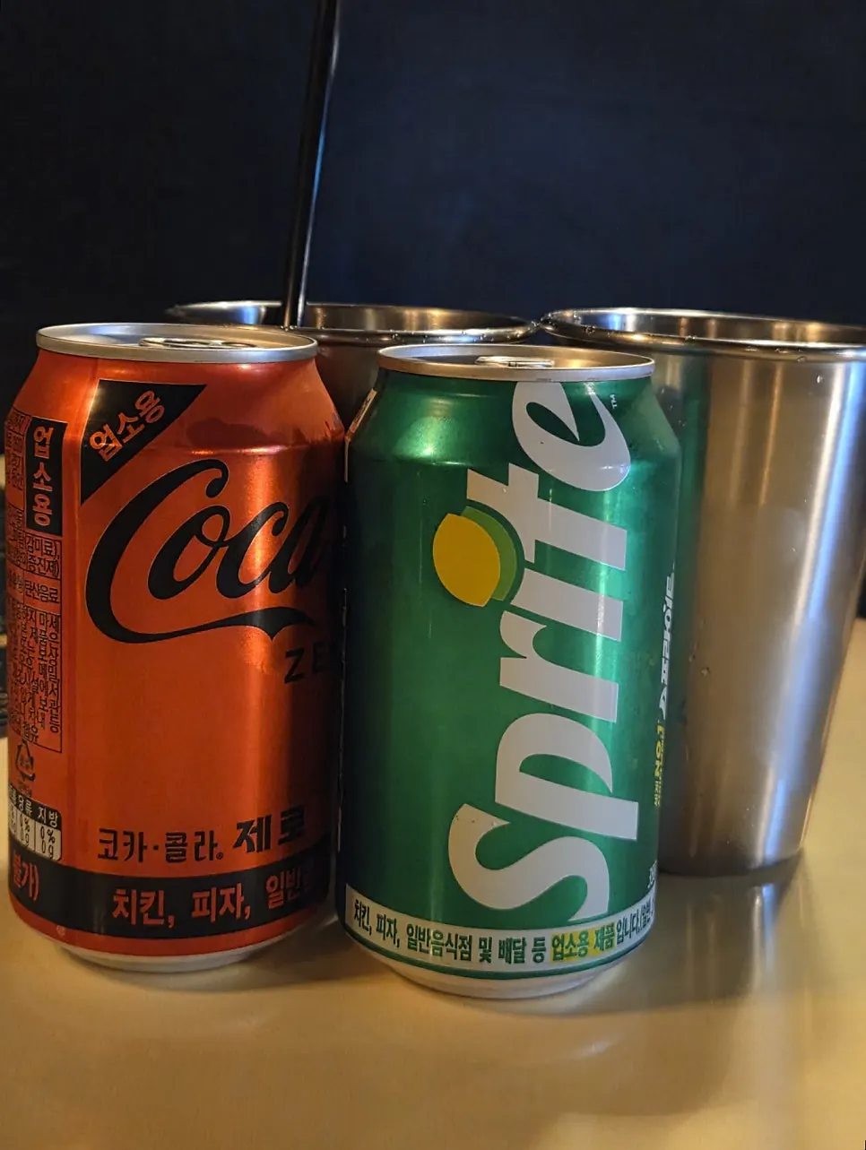 Soda served with a cup of ice