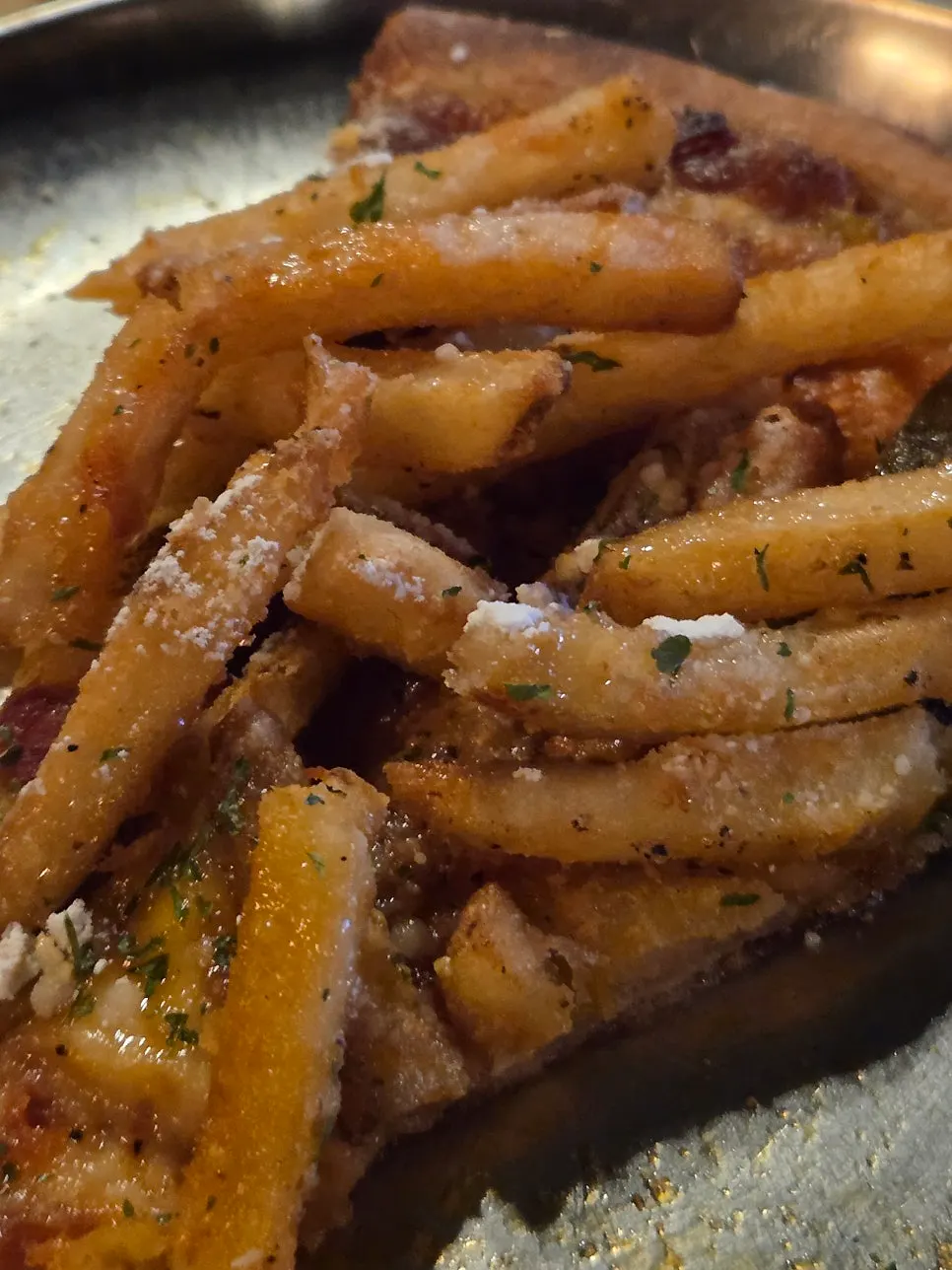 Sweet-and-salty Potato Killer slice drizzled with honey