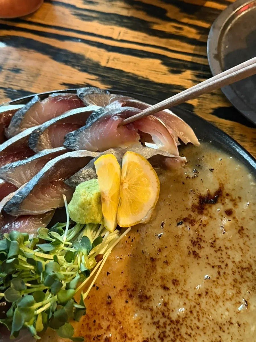 Plate of mackerel sashimi with sesame sauce