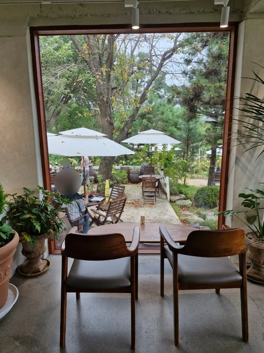 Café entrance with fresh melon season menu banners
