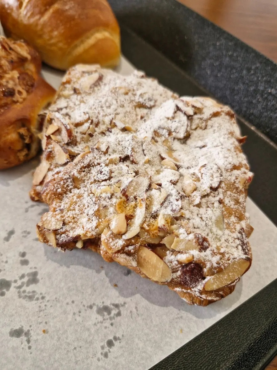 A tray with salt bread and croissant