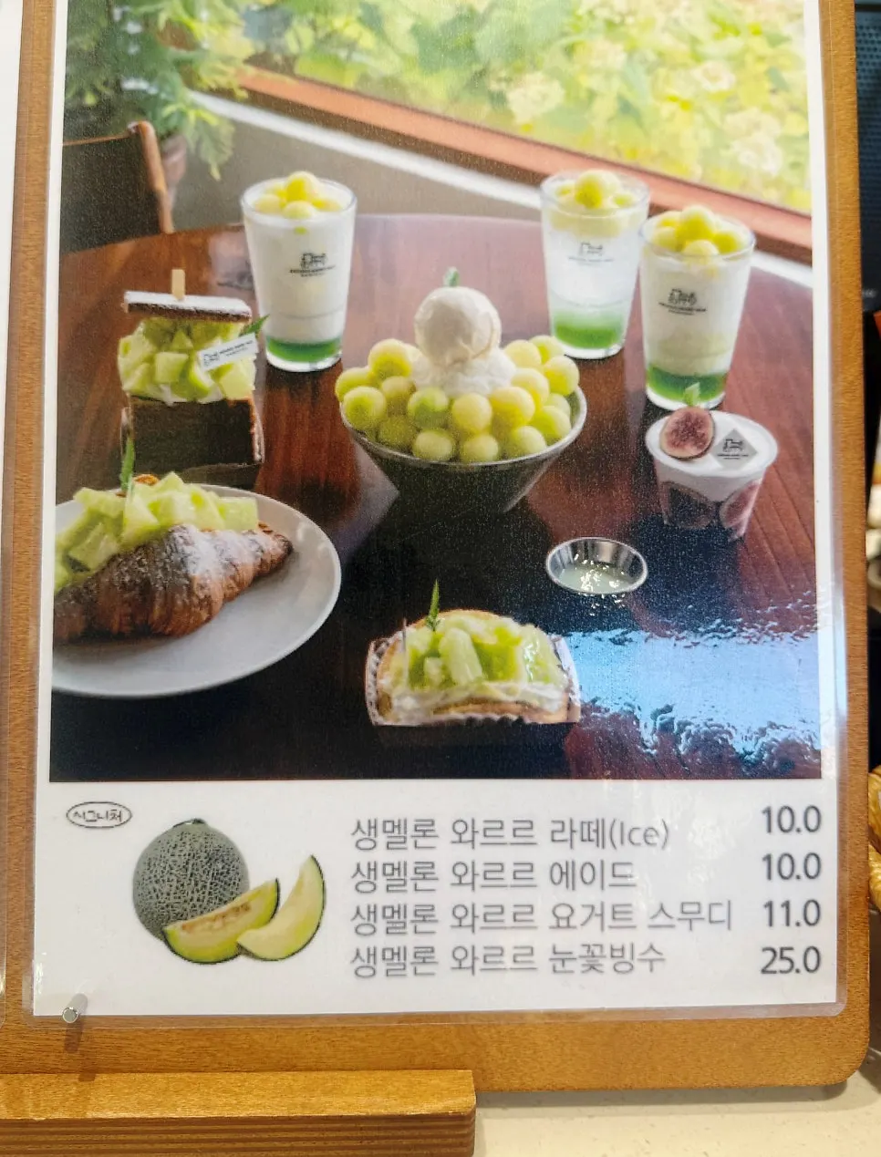 Indoor fridge displaying whole melons