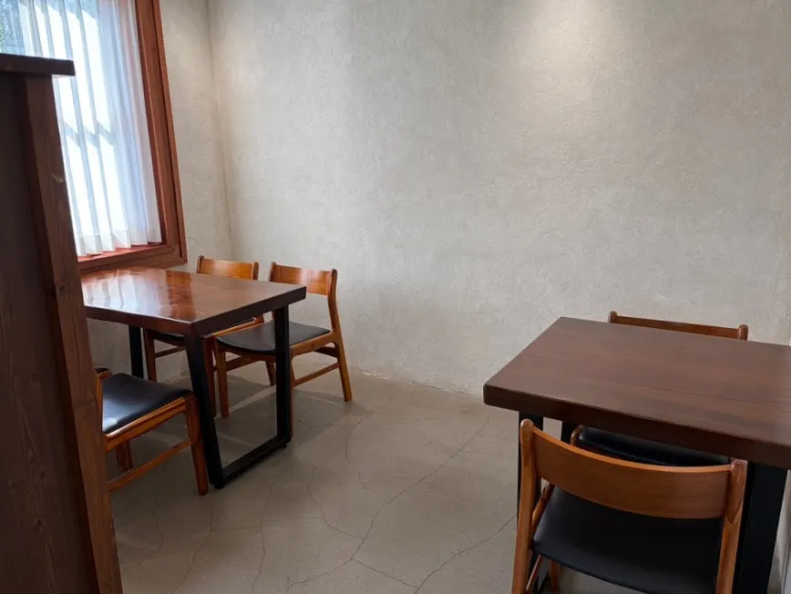 Café interior with window-side tables