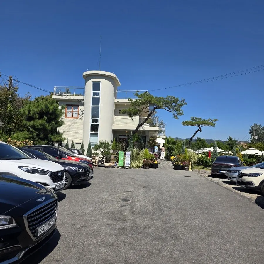 View of Baedagol Bakery House's building and garden