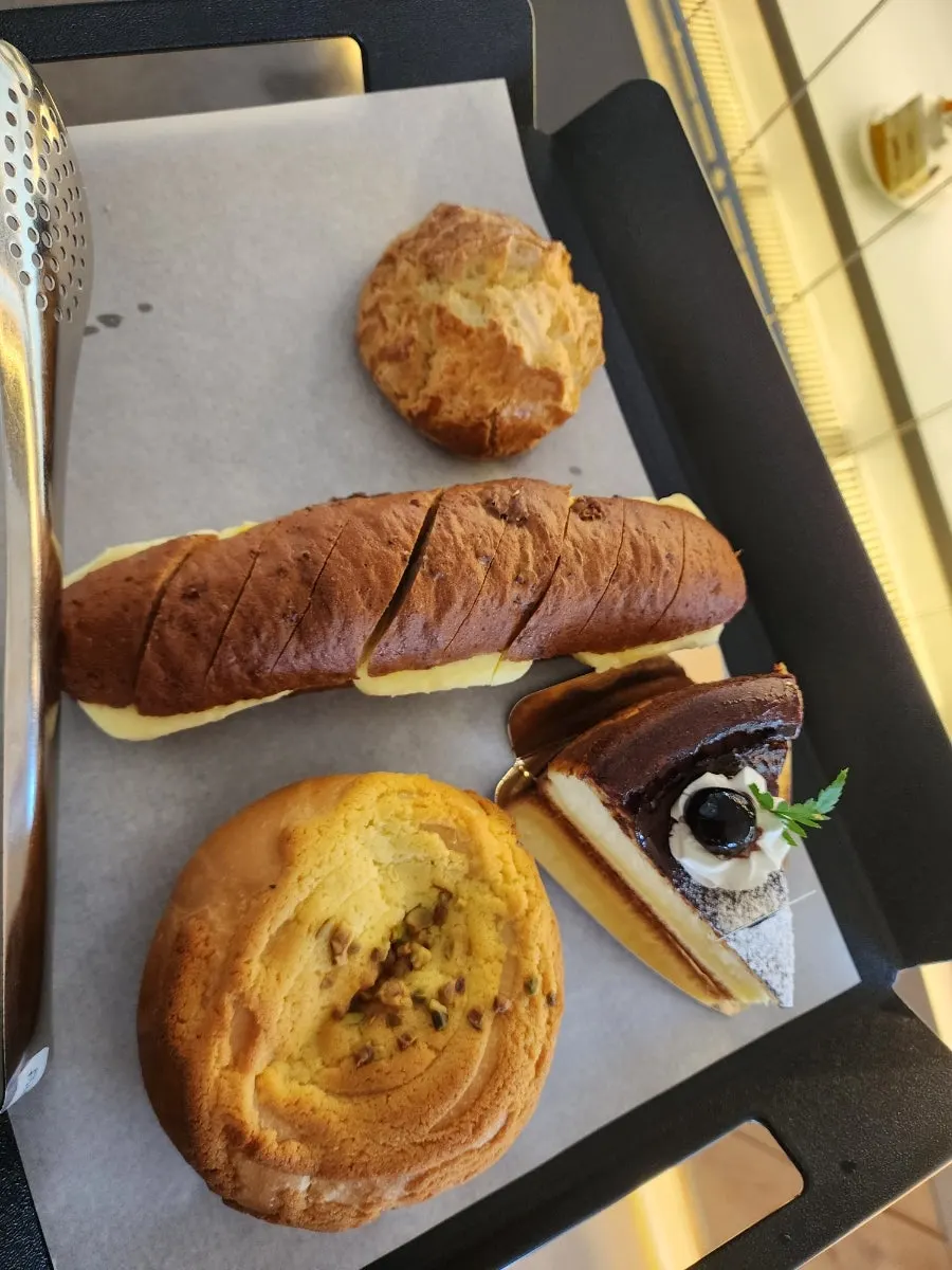 Vertical shot of the bread display at Baedagol Bakery House