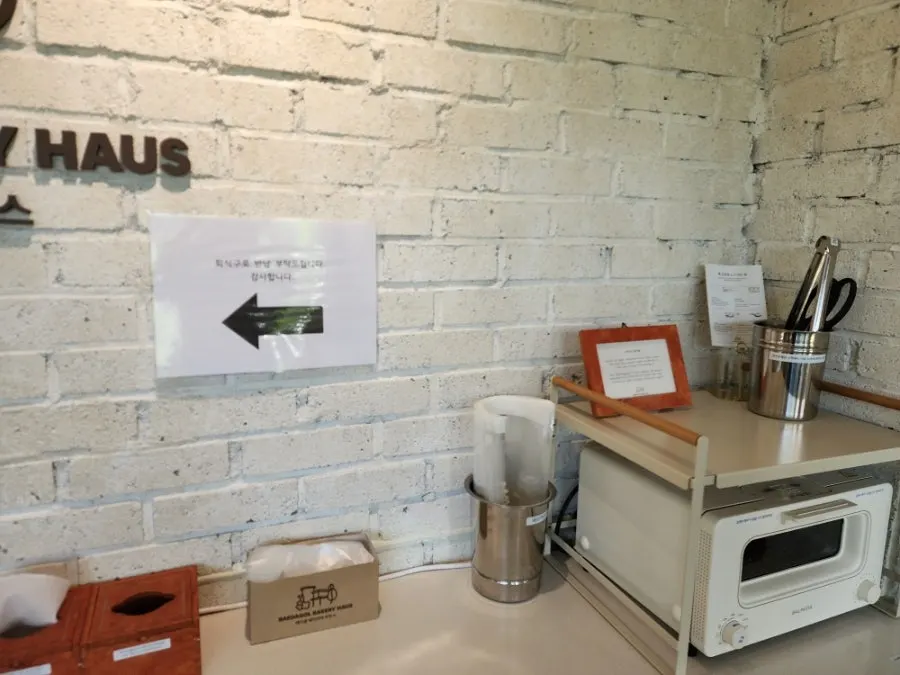 Interior of the café with kids-care zone signage