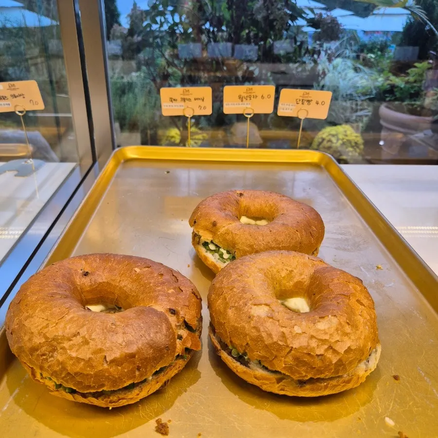 Bread display case emptying out in the afternoon