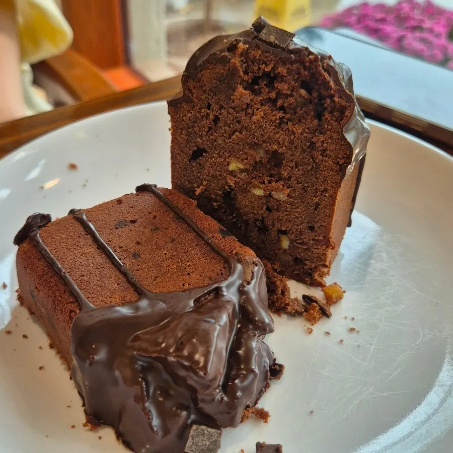 Cake interior studded with nuts and chocolate bits