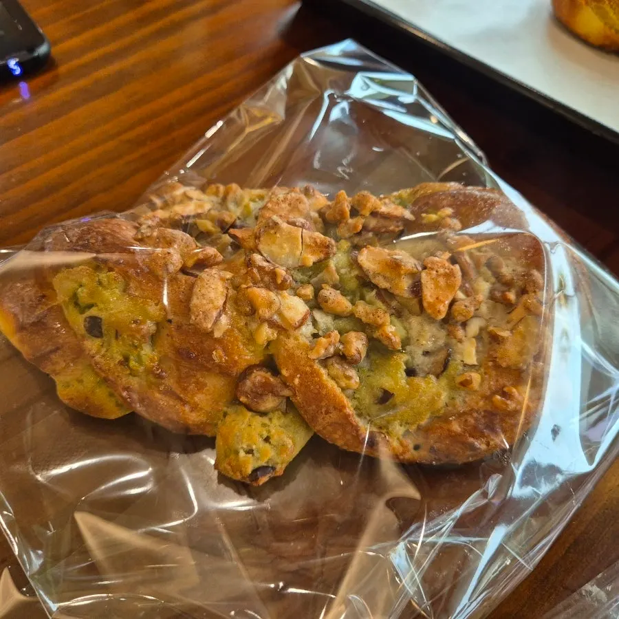 Basil tomato baguette packaged to take home
