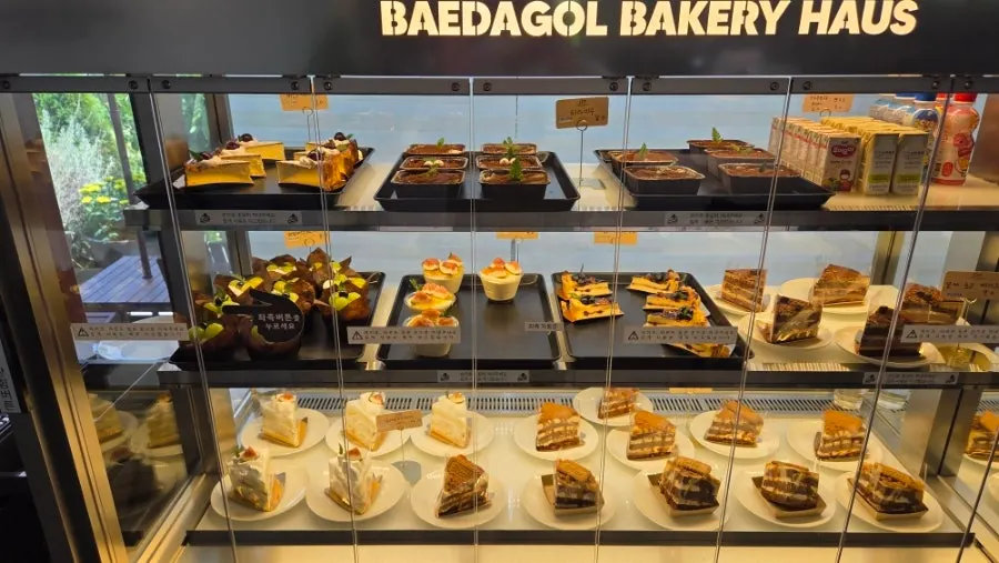 Seating with a view out the window at Baedagol Bakery House
