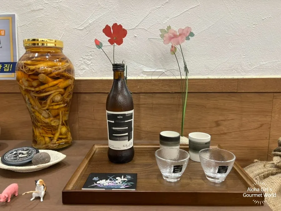 Menu board at Baekok Myeongdong, focused on gomtang