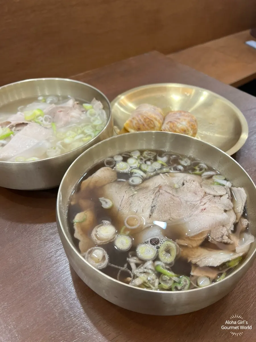 Toryeom-style gomtang with rice ladled into the broth
