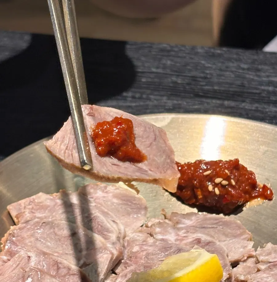 A half plate of cold jeyuk with dadagi sauce