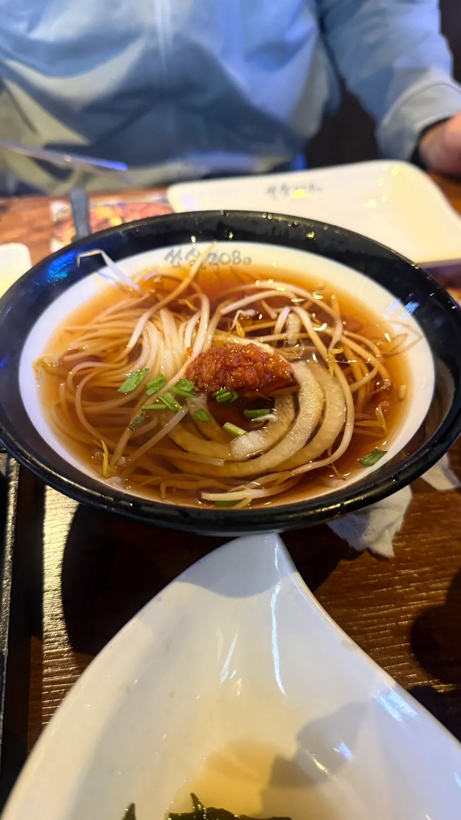 Complimentary pho served with the basic table setting