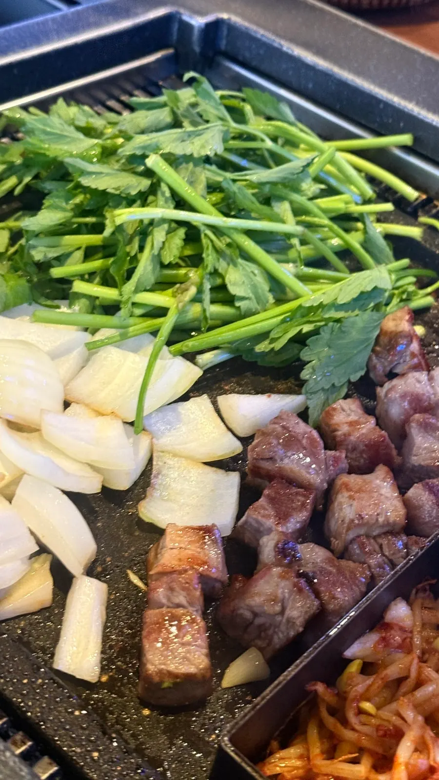 A piece of five-layer pork belly infused with smoky flavor