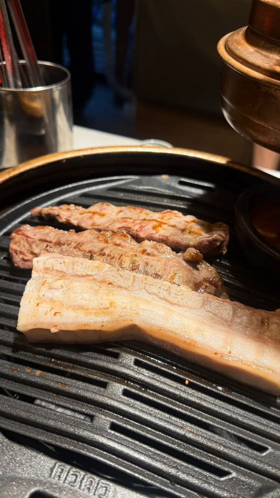 Cooked meat placed on a dedicated tray