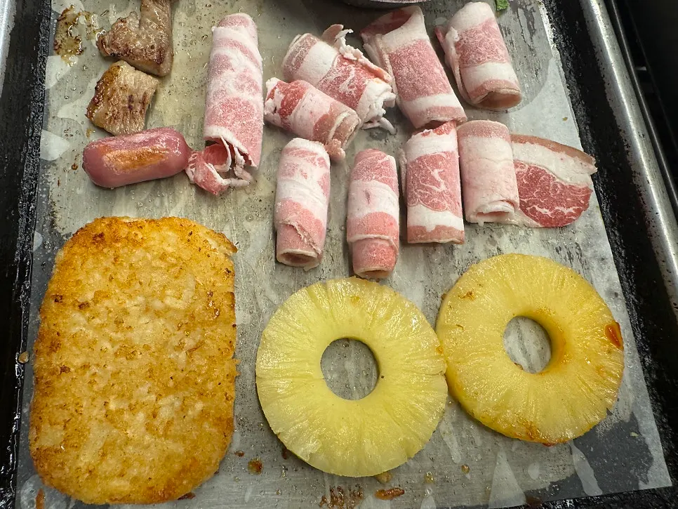 Table prepared with shellfish and meat