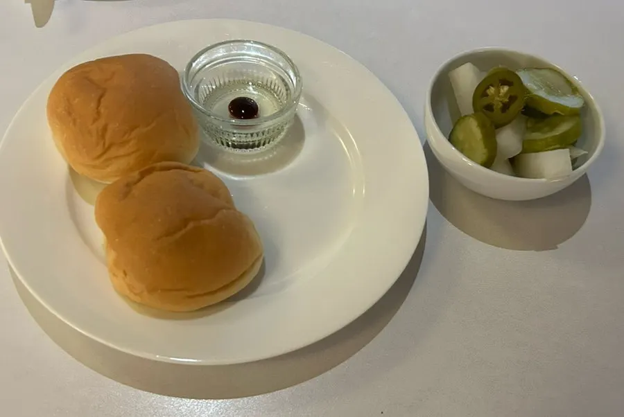 Warm pre-meal bread served with balsamic sauce