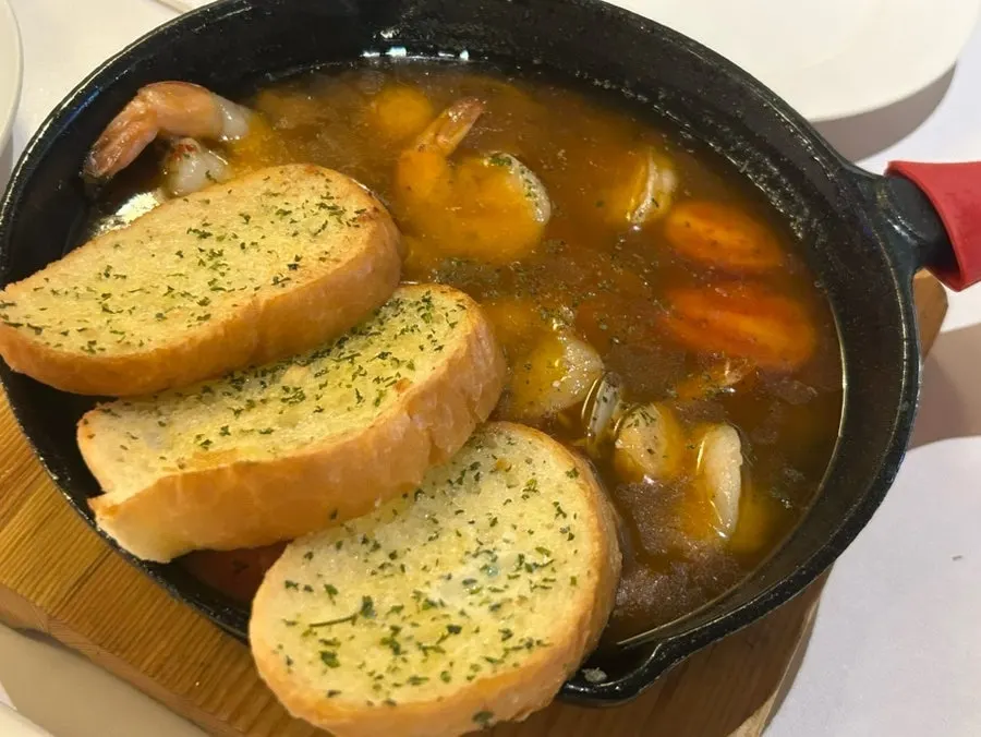 Gambas served in a hot pot