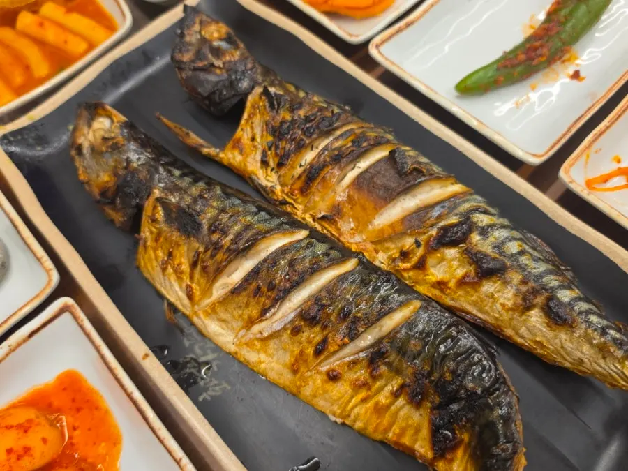 Close-up of the crispy-skinned wood-fired grilled mackerel