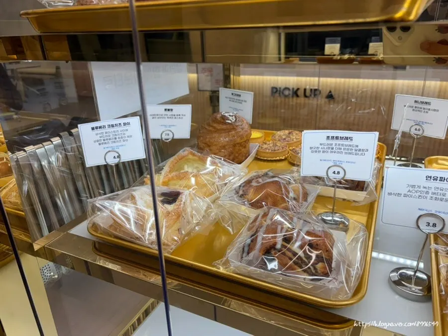 Various types of bread displayed at Baegya Coffee