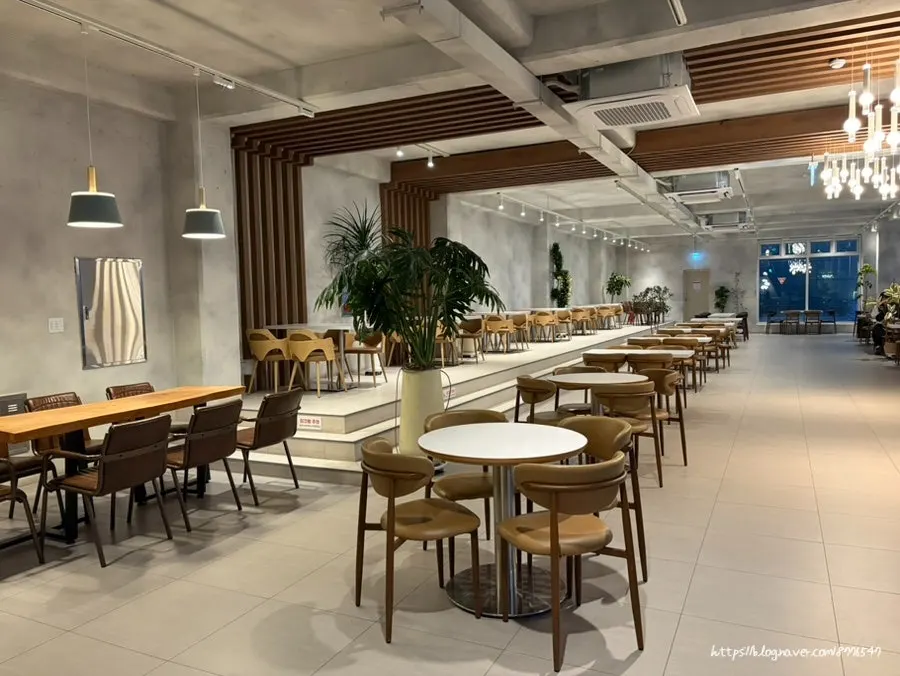Indoor seating with sea views at Baegya Coffee