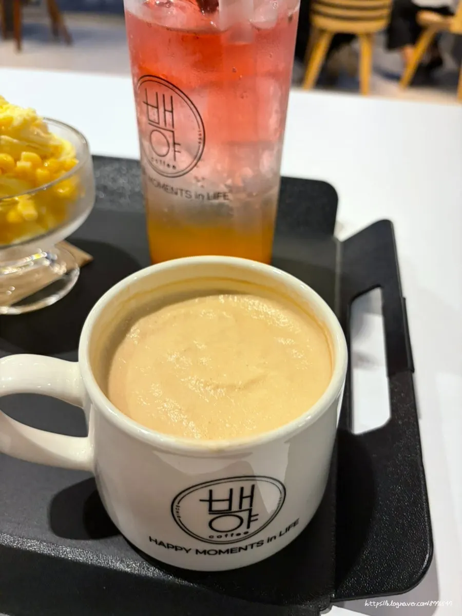Yellow corn ice cream with the sea in the background