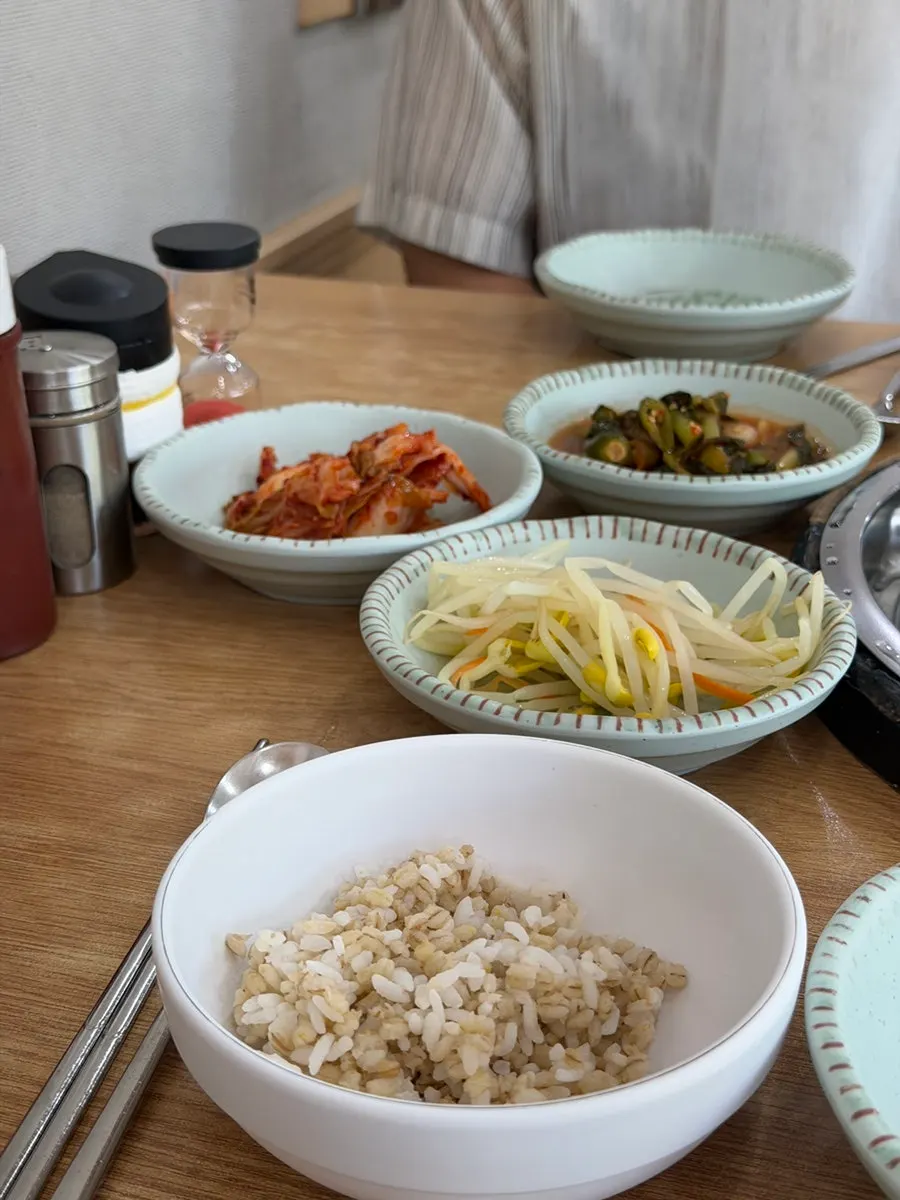Side dish plate with bean sprouts and yeolmu kimchi